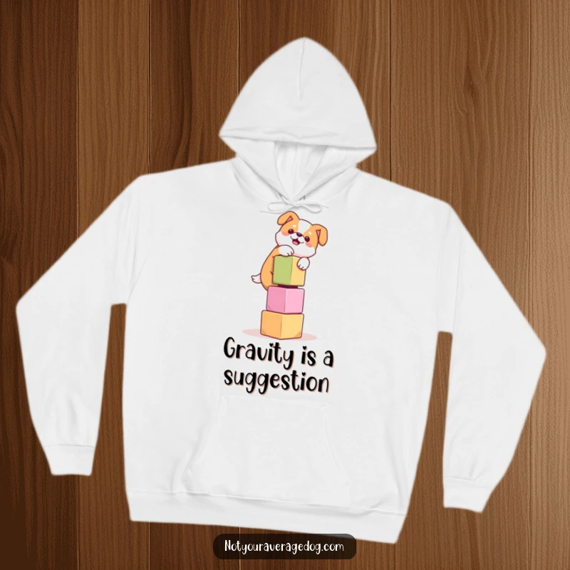 Funny hoodie featuring a dog attempting to balance a tall stack of wobbly cubes, creating a humorous scene of adorable struggle.