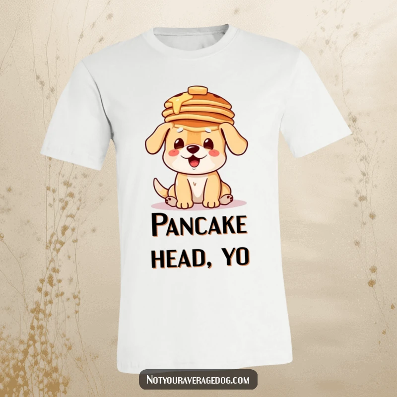 Funny t-shirt depicting a dog in a comical attempt to balance a precarious stack of pancakes perfectly on its head.